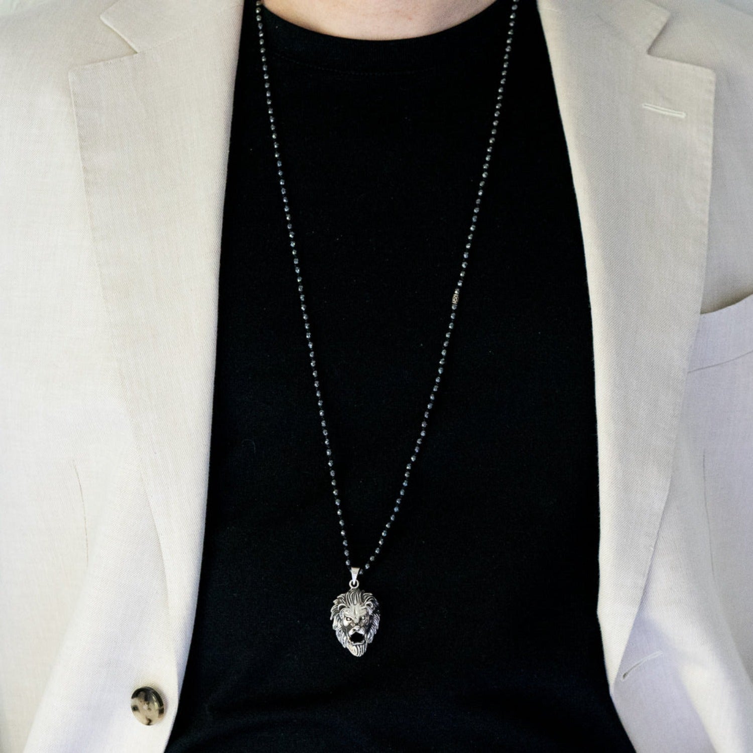 Confident and Stylish - Model wearing Silver Leo Necklace.