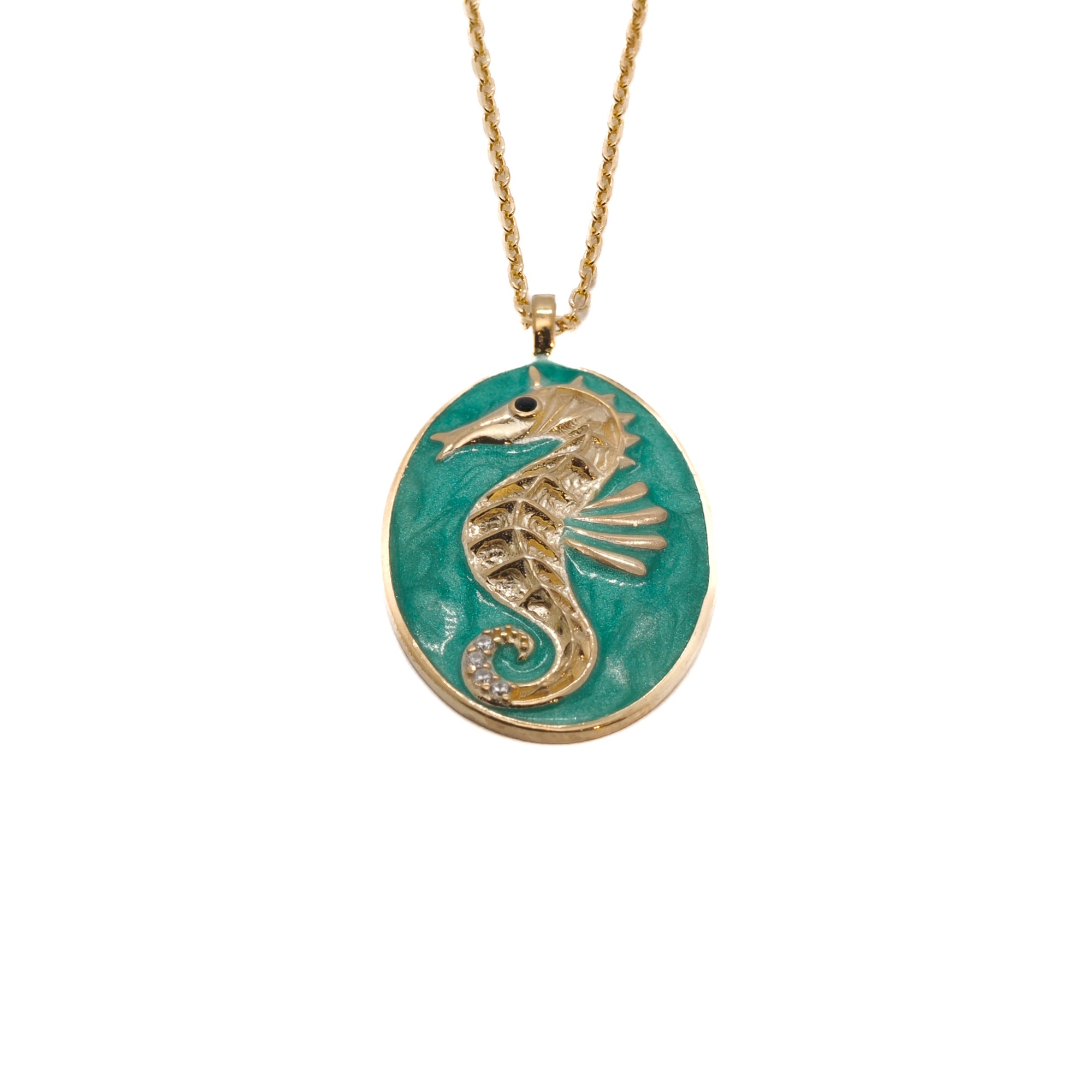 A close-up of the Spirit Animal Green Seahorse Necklace, showcasing the intricate detailing and captivating green enamel of the seahorse pendant.