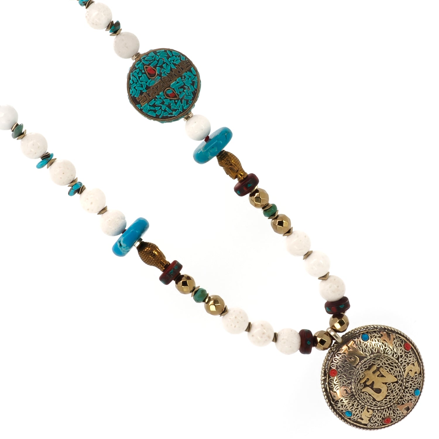Spiritual Journey: Handcrafted pendant with turquoise and coral on the Mantra Necklace.