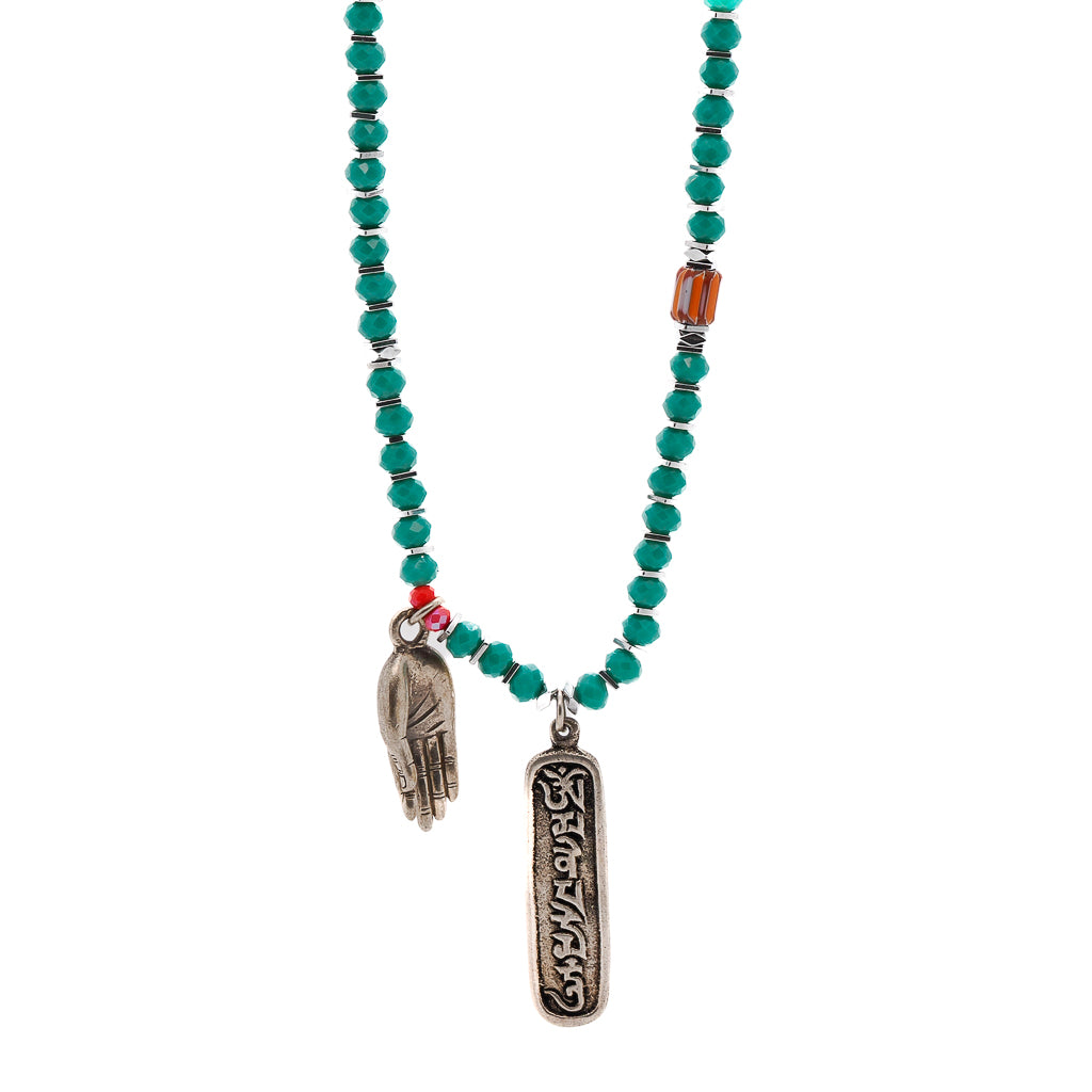 Handcrafted Necklace showcasing the beauty of green crystal beads and a Tibetan silver pendant.