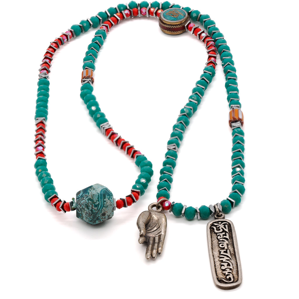 Handmade Necklace with vibrant green crystal beads and a meaningful Om Mani Padme Hum pendant.