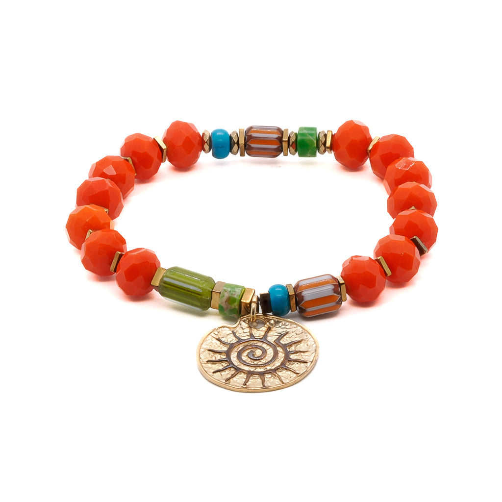 Experience the positive energy of the Spiritual Sun Bracelet, featuring vibrant orange crystal beads, gold hematite spacers, and a sterling silver sun charm.