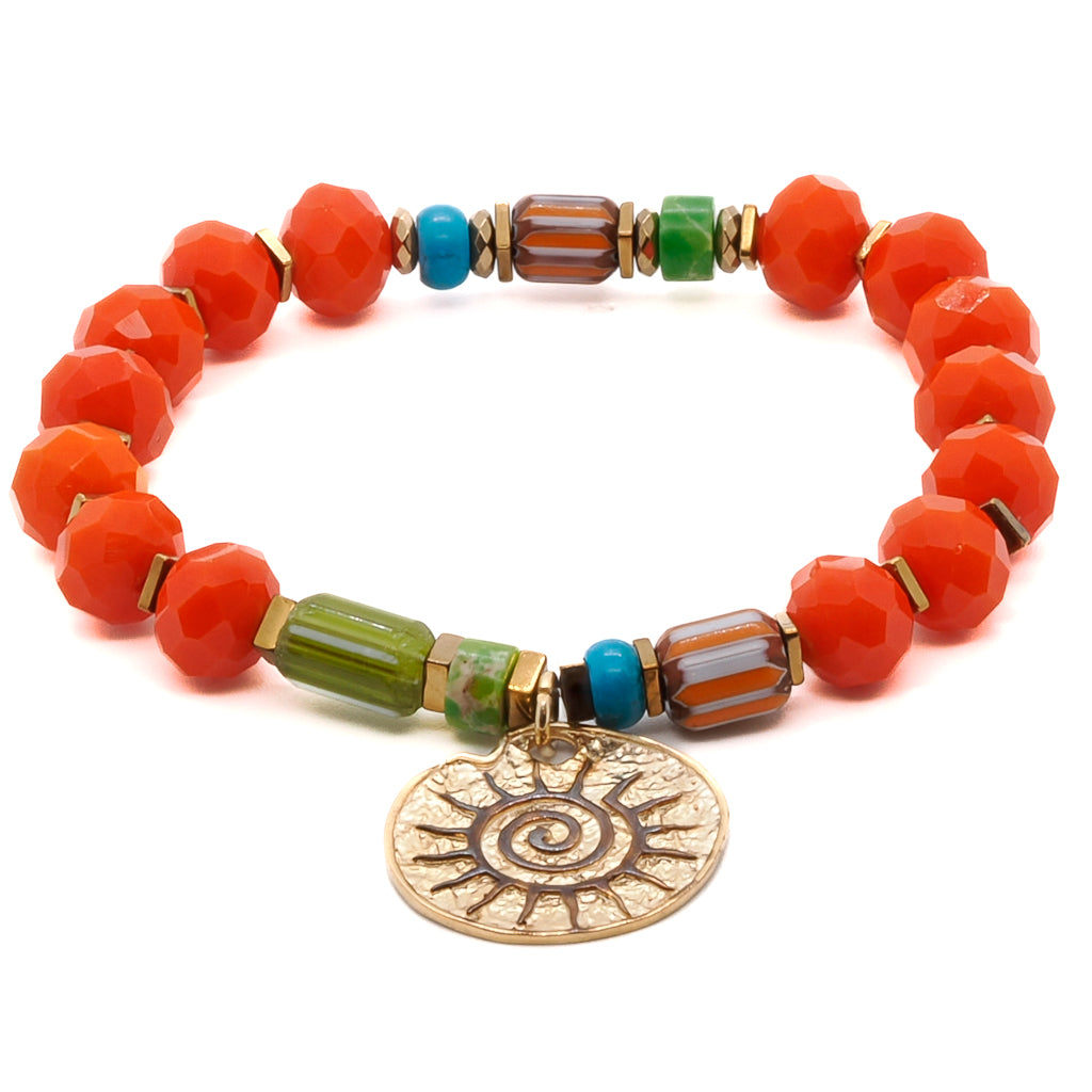 Add a touch of positivity and style with the Spiritual Sun Bracelet, adorned with vibrant orange crystal beads, colorful African beads, and a sun charm.