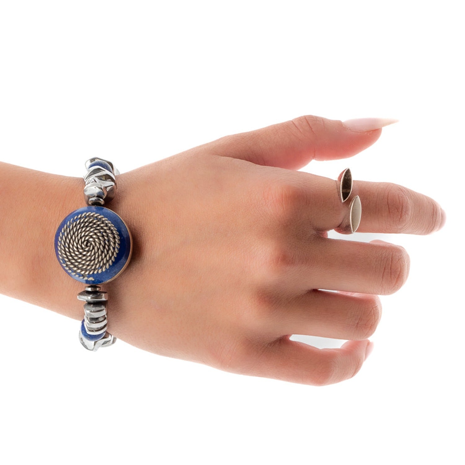 Experience the beauty of the Strong Women Bracelet as the model showcases its unique combination of silver hematite and lapis lazuli stone beads.