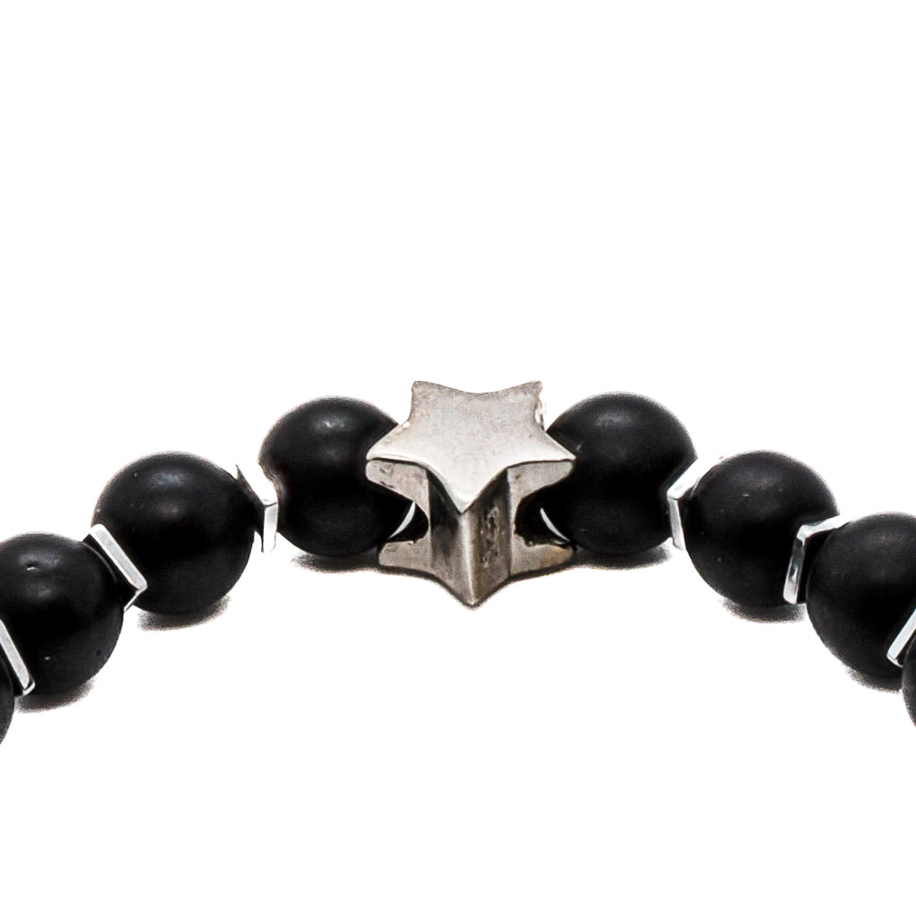 Add a touch of sophistication to your style with the Sugar Skull Onyx Bracelet, adorned with Matte black onyx stone beads and elegant Hematite stone spacers.