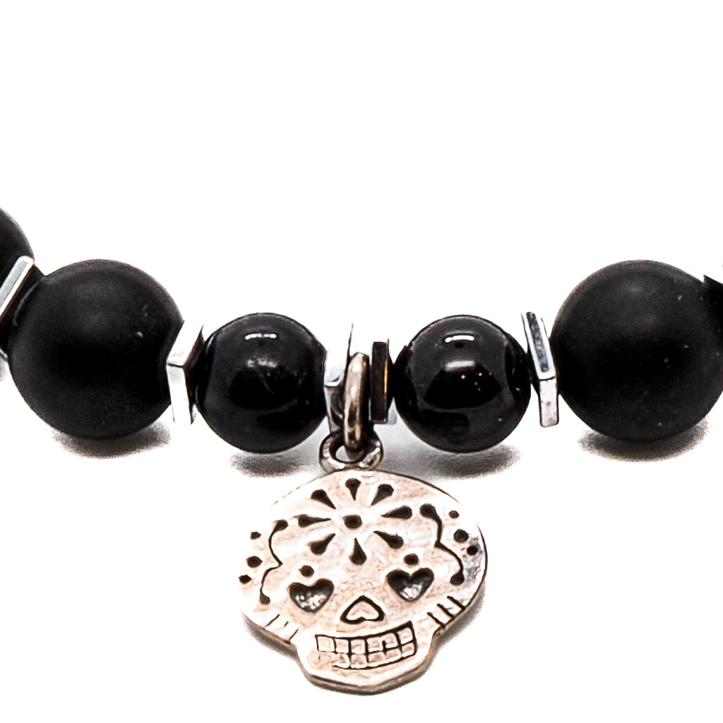 Discover the empowering energy of the Sugar Skull Onyx Bracelet, handmade with attention to detail and a touch of celestial beauty.