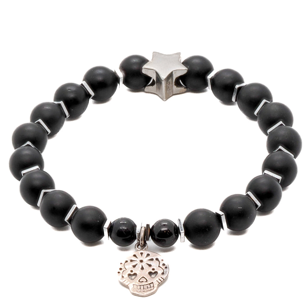 The Sugar Skull Onyx Bracelet resonates with the celebration of life, featuring a stunning Sterling silver sugar skull charm and Matte black onyx stone beads.