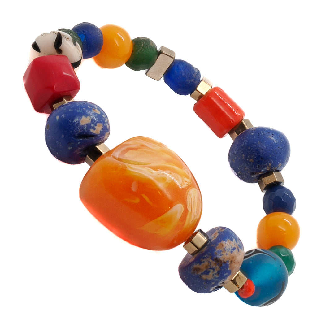 Celebrate the carefree and colorful essence of summer with the unique and delightful Summer Bracelet, adorned with Nepal blue beads and an Evil Eye charm.