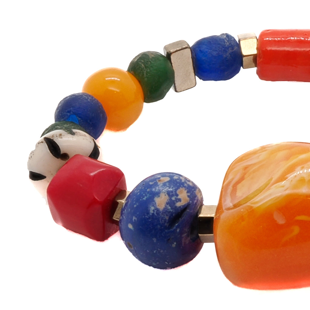 Capture the joyful energy of summer with the eye-catching Summer Bracelet, handcrafted with glass beads and gold hematite spacers.