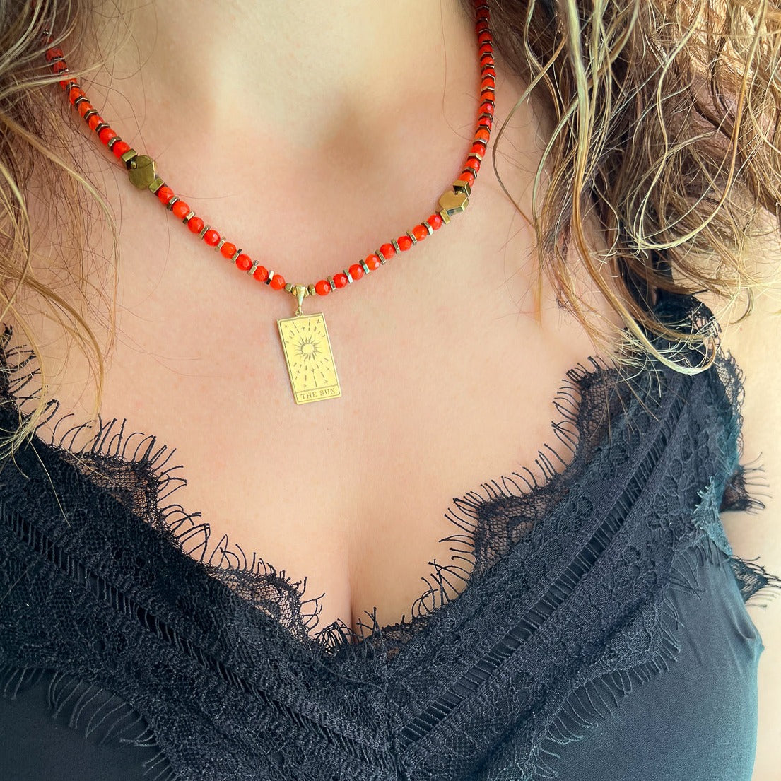 Model Wearing Gold Hematite Stone Necklace: Grounded and centered in style