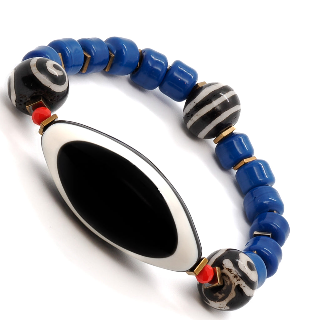 Discover the beauty and meaning of the Third Eye Tibetan Bracelet, handcrafted with care and vibrant colors.