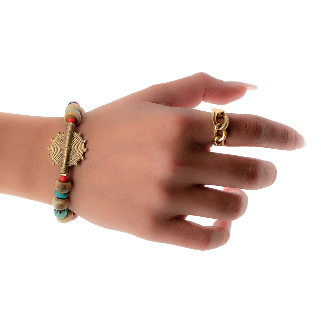 The model wearing the Tibetan Ethnic Bracelet, showcasing its ethnic charm and vibrant colors.