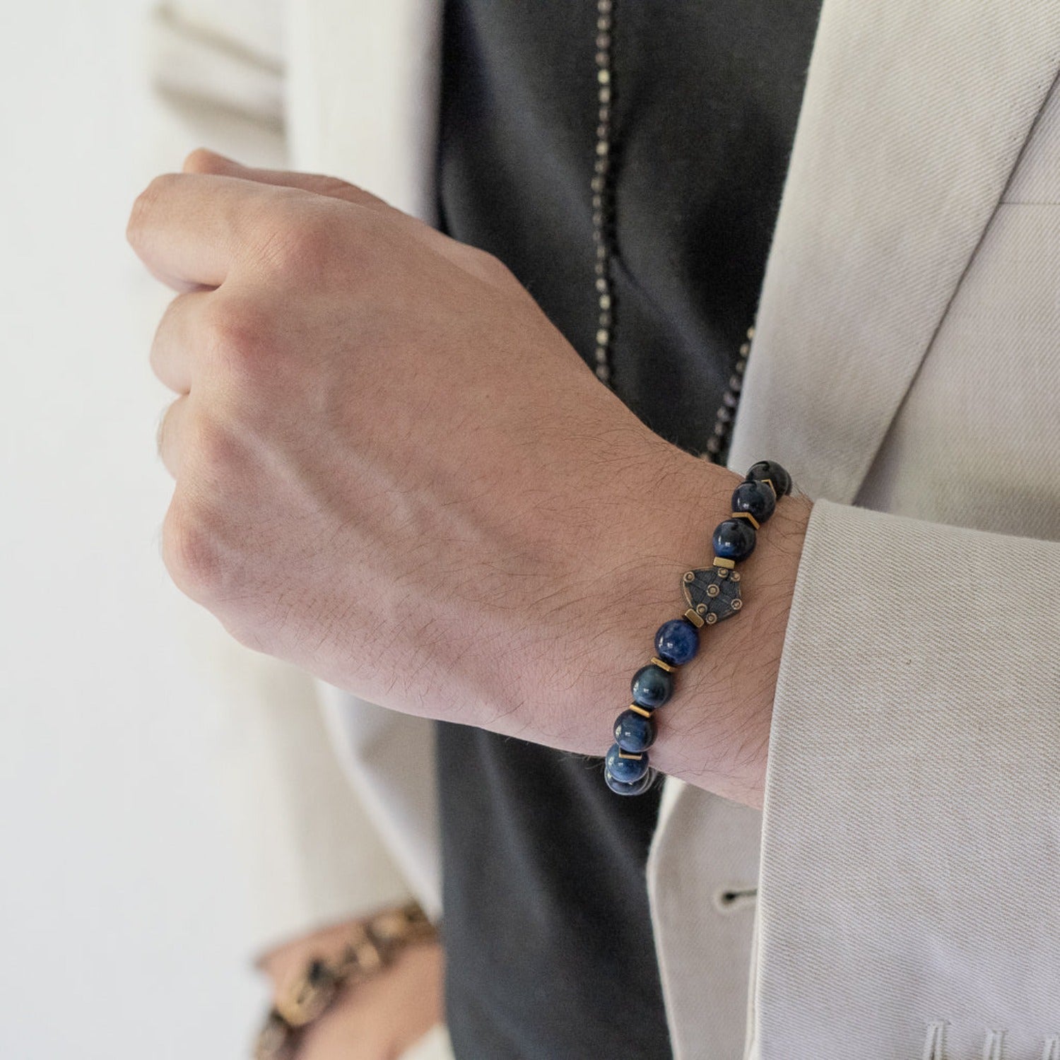 Embrace Courage - Model Wearing Tiger Eye Shield Bracelet.