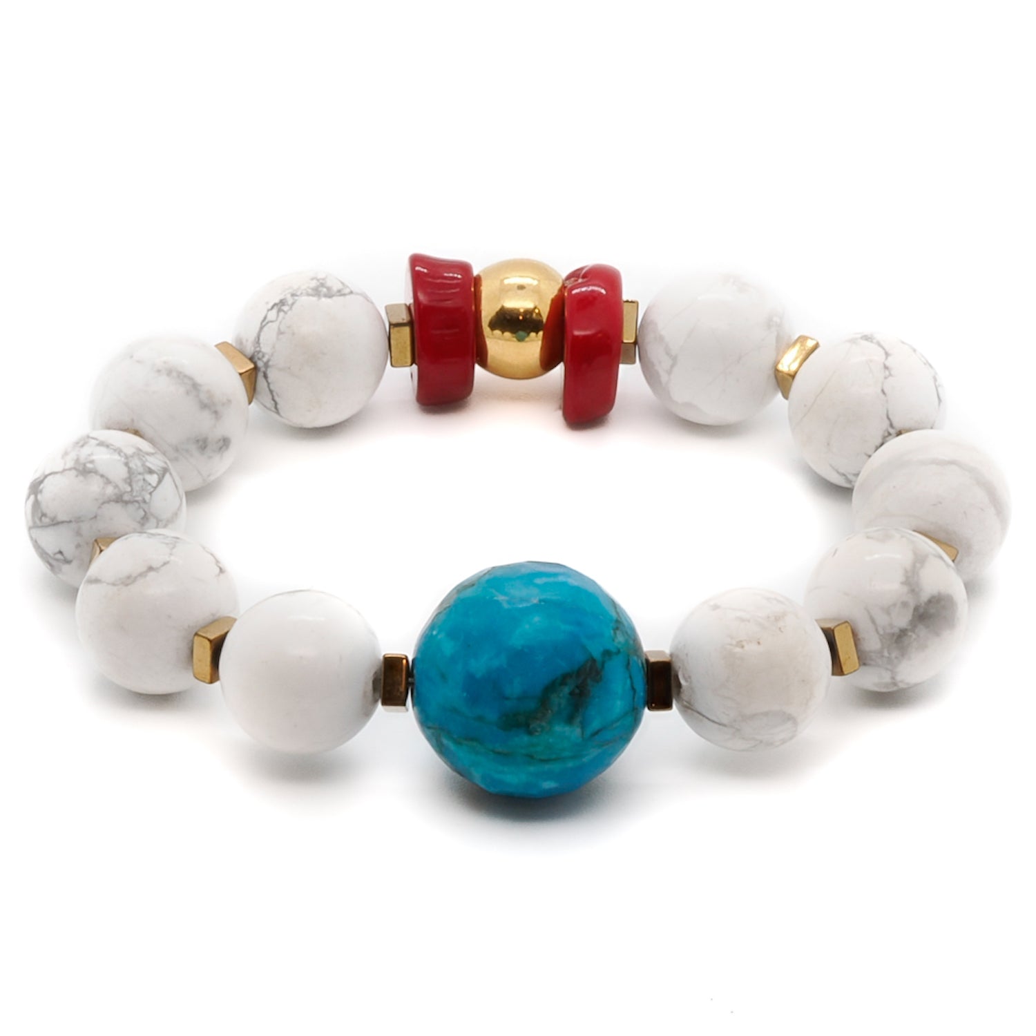 Embrace the beauty of the Turquoise Balance Bracelet, featuring turquoise, howlite, and red coral stone beads.