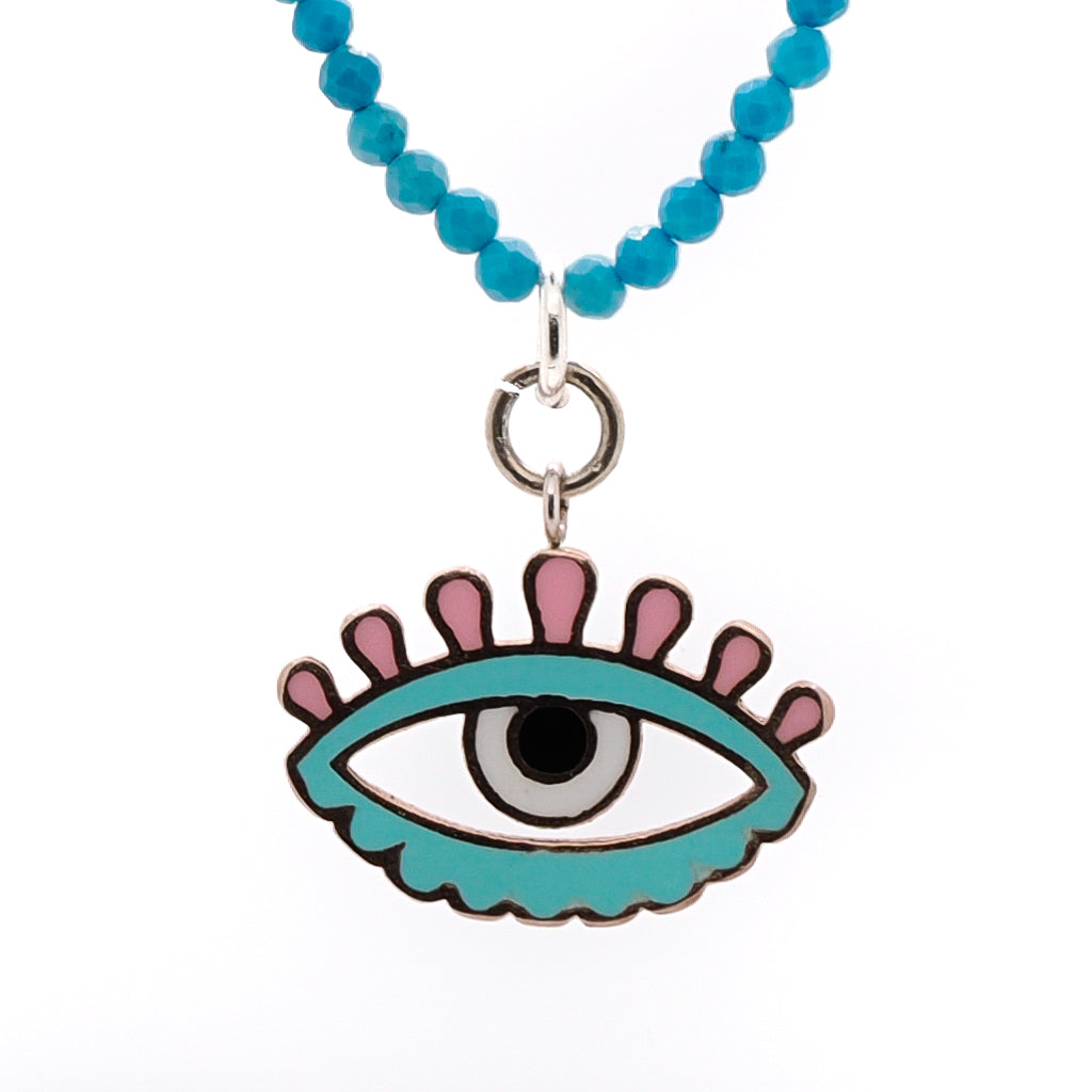 Turquoise Candy Evil Eye Necklace featuring a stunning silver Evil Eye charm with white, turquoise, and pink enamel, accompanied by natural turquoise stone beads.