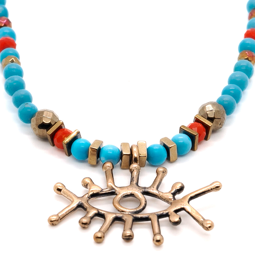 Handmade Turquoise and Evil Eye Necklace - Balance and protection in a stunning design.