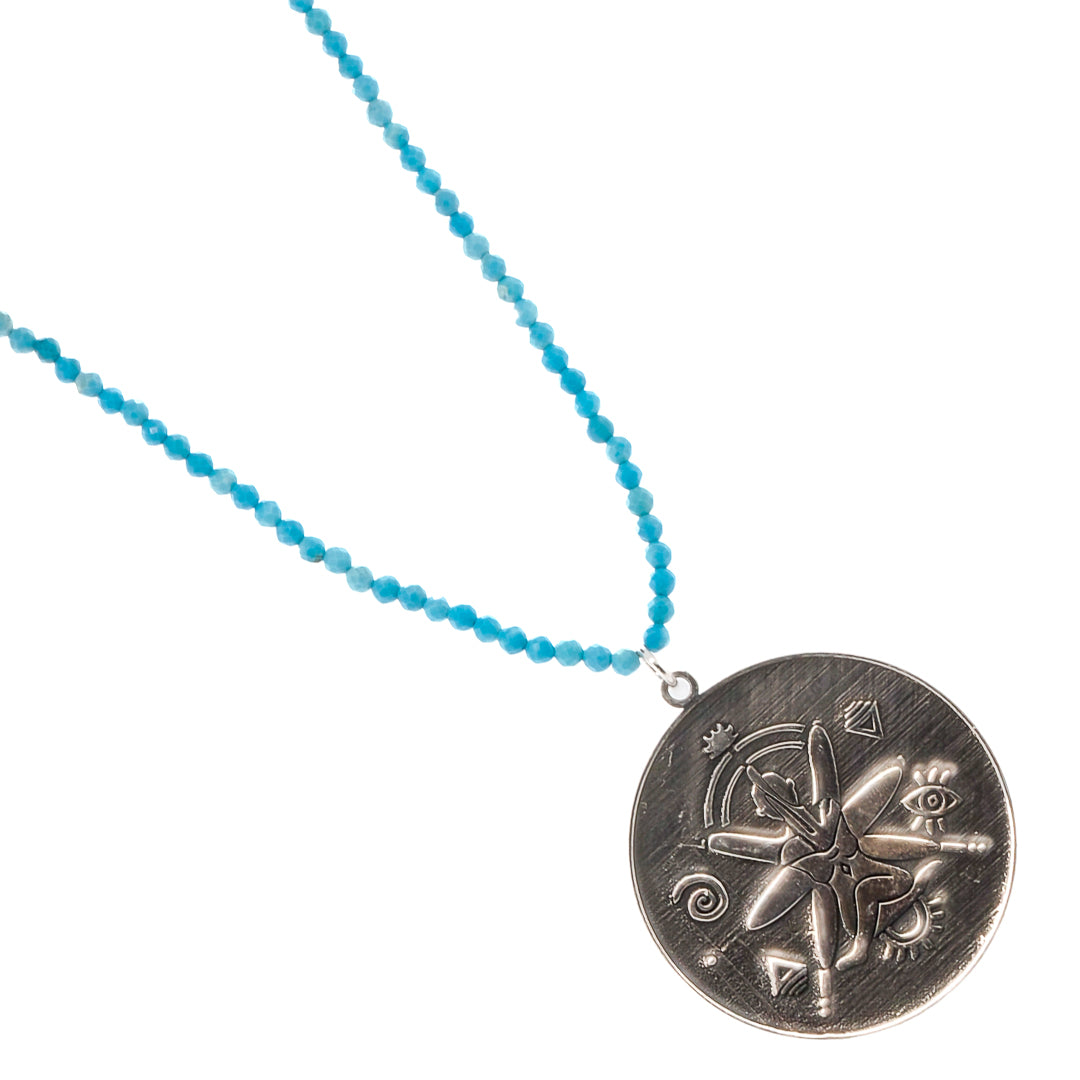 Turquoise Necklace with Sterling Silver Pendant - Stand out with this meaningful accessory.