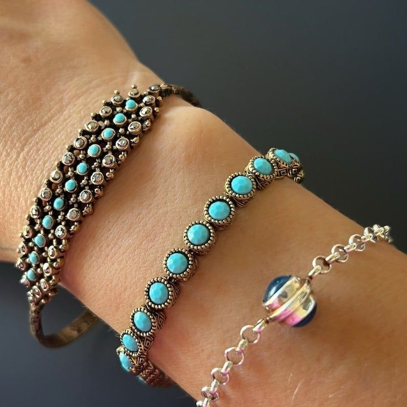 A detailed shot of the handcrafted Turquoise Tennis Bracelet, radiating positive energy.