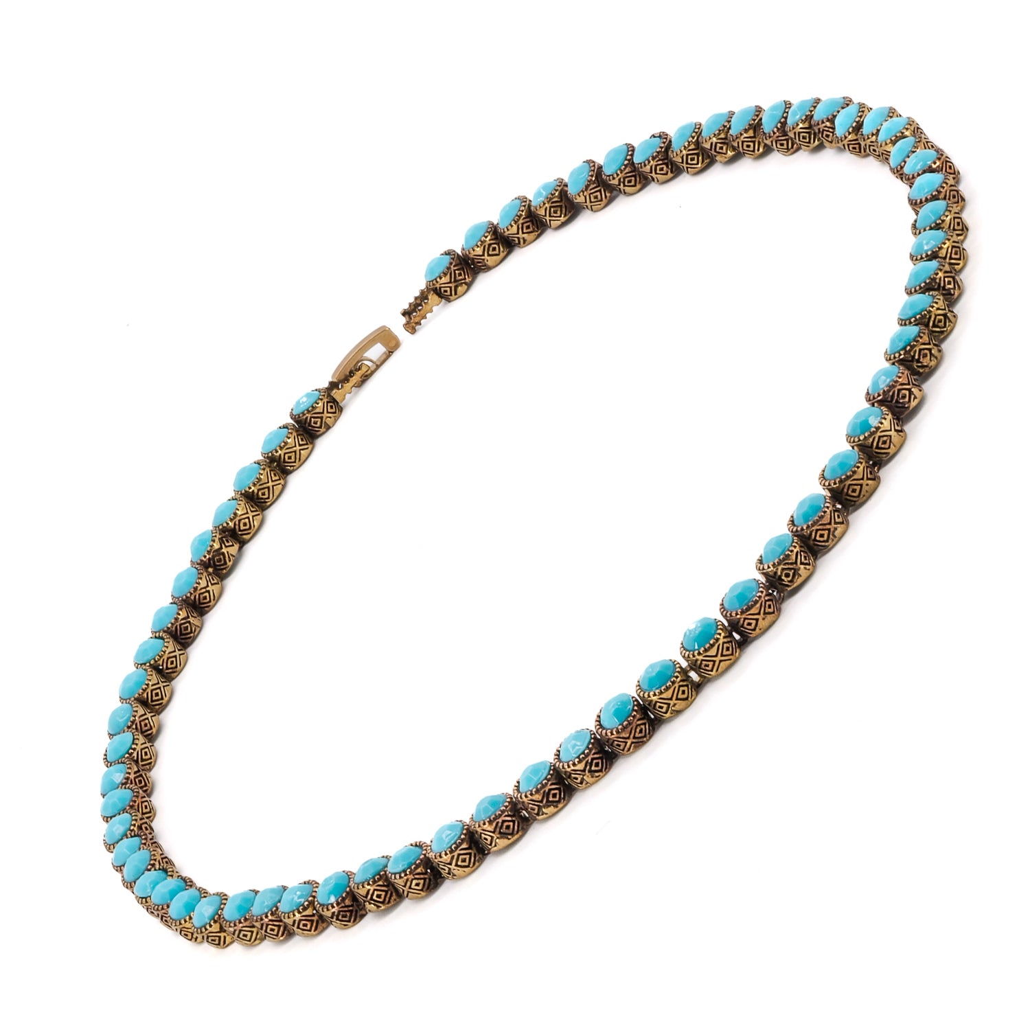 Experience the transformative power of turquoise with this eye-catching handmade necklace, a symbol of positivity and spiritual growth.