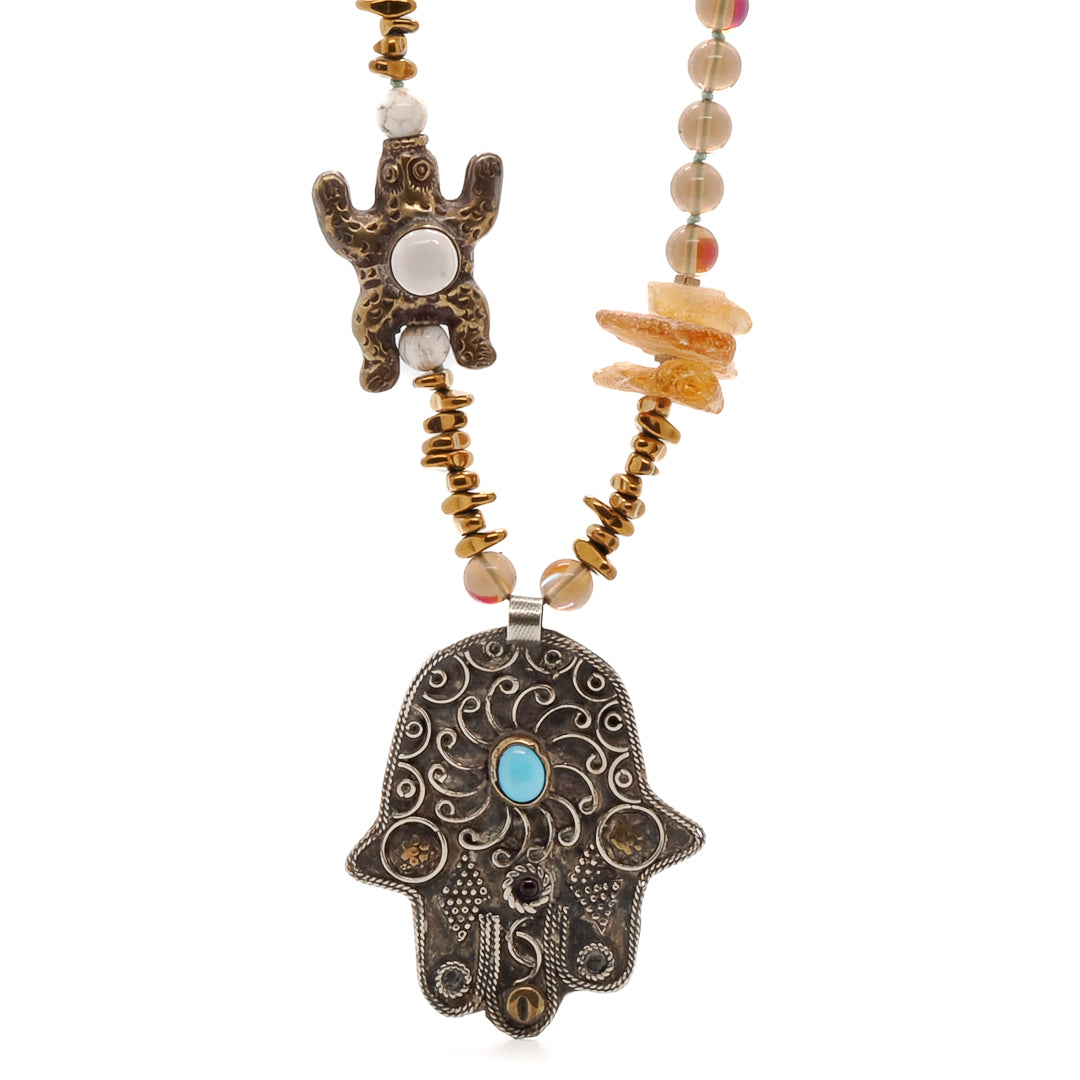 Embrace the symbolism of the Turtle Necklace, a handmade piece that represents protection and good luck.