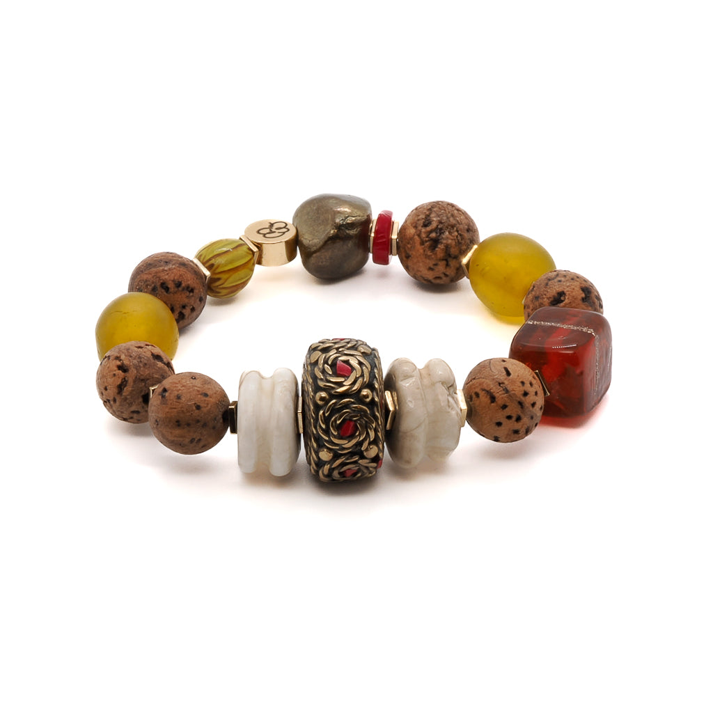 Discover the vintage charm of the Vintage Style Bohemian Bracelet, featuring Nepal seed beads, Tibetan bone beads, and African beads.