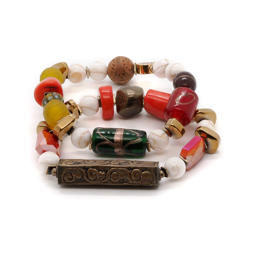 Explore the vintage elegance of the Vintage Style Tibetan Bracelet Set, featuring Tibetan bone beads, African beads, and coral stones.