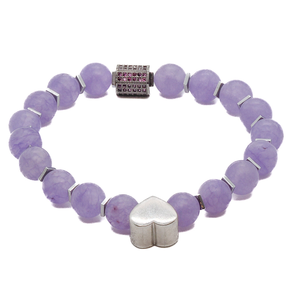 Discover the harmony and elegance of the Violet Love Bracelet, crafted with purple jade beads, sterling silver heart charms, and a shimmering Swarovski crystal accent.