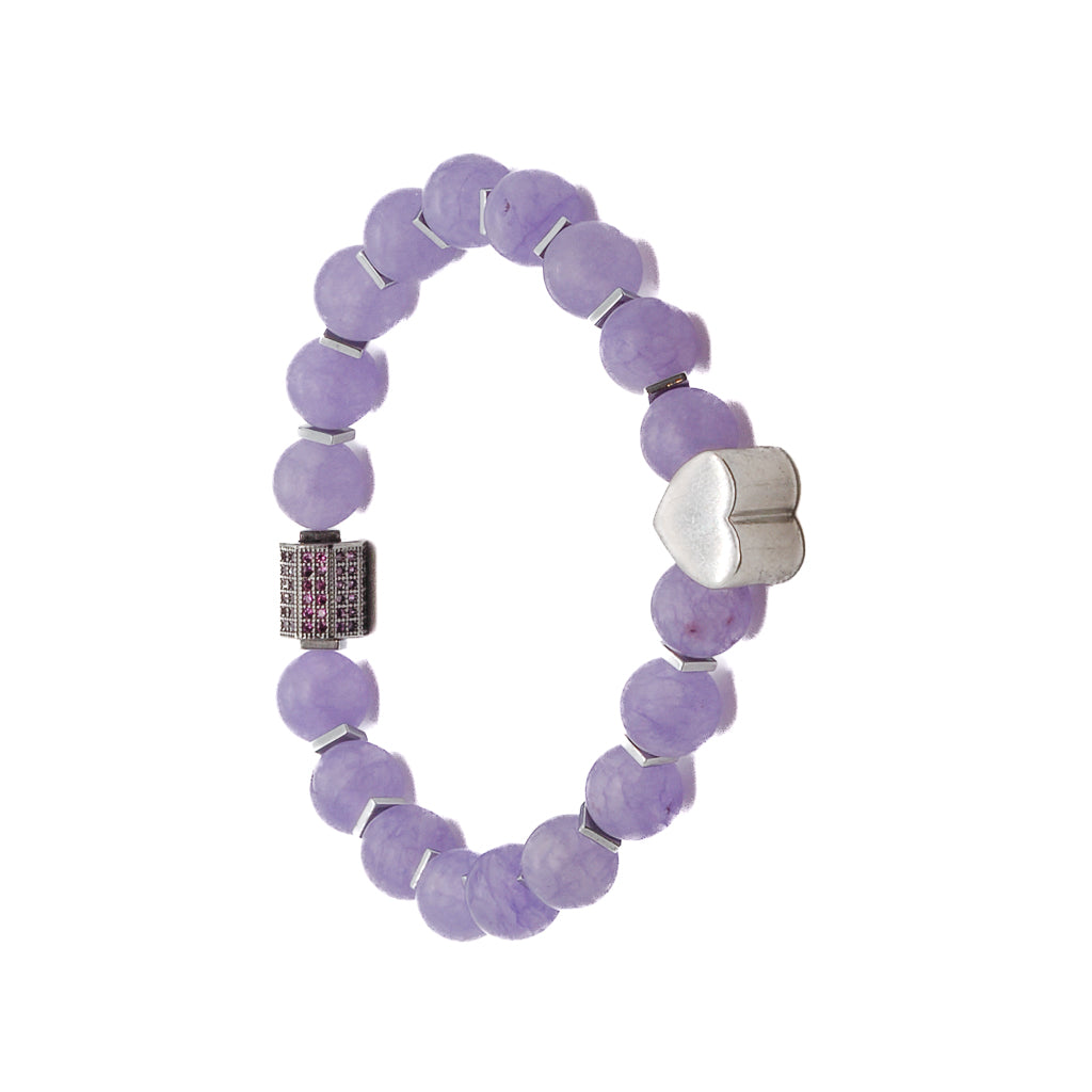 Experience the heartfelt energy of the Violet Love Bracelet, adorned with purple jade beads, sterling silver heart charms, and a sparkling Swarovski crystal accent.