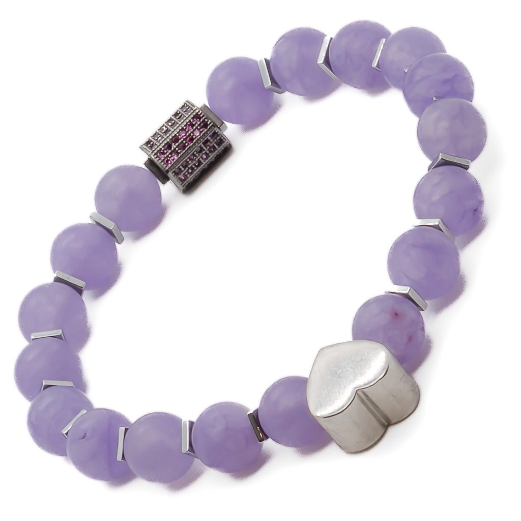 Elevate your look with the Violet Love Bracelet, featuring vibrant purple jade beads, sterling silver heart charms, and a captivating Swarovski crystal accent.