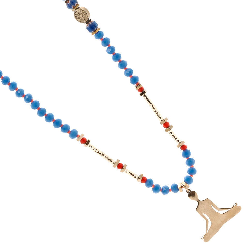 Handmade necklace with a combination of blue and red Nepal beads, gold-plated tube beads, and a meaningful Om Mani Padme Hum mantra bead.