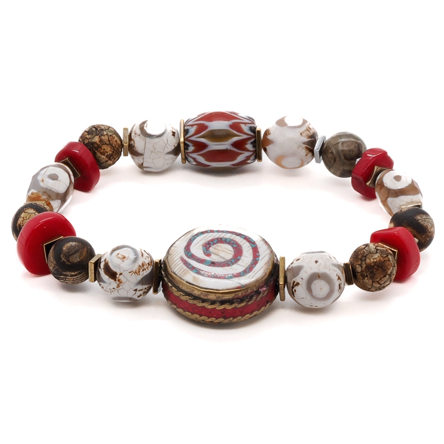 Embrace the positive energy of the Yoga Spirit Mystic Bracelet, featuring coral stone beads, Nepal meditation beads, and a spiral charm with coral stone inlay.