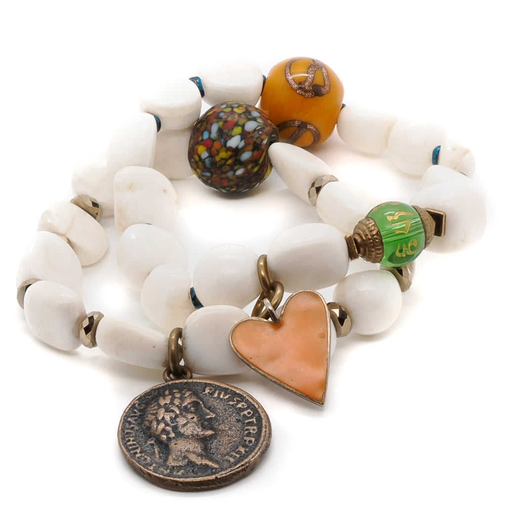 Elevate your sense of calm with the Zen Bracelet Set, featuring Tibetan White Stone Beads and intention-filled charms.