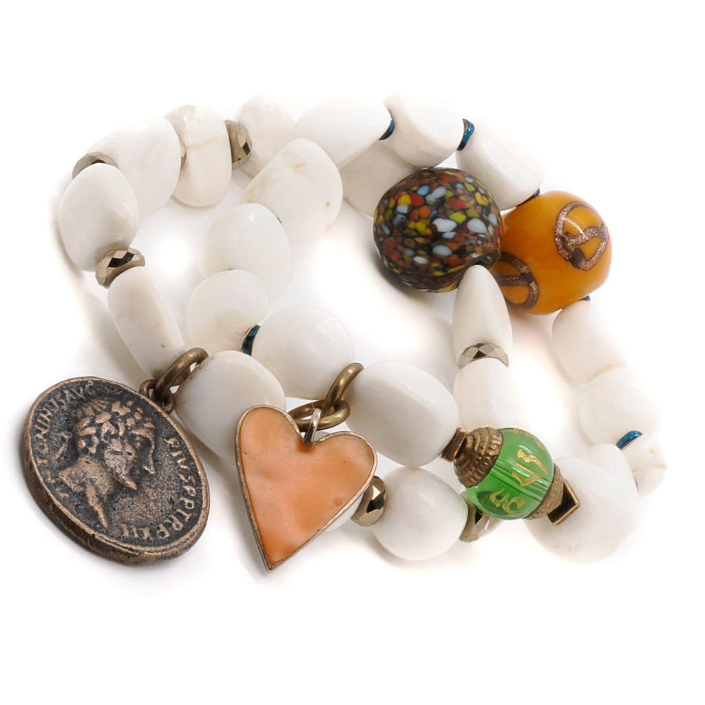 Embrace the mindfulness of the Zen Bracelet Set, a handmade accessory adorned with Tibetan White Stone Beads and meaningful charms.